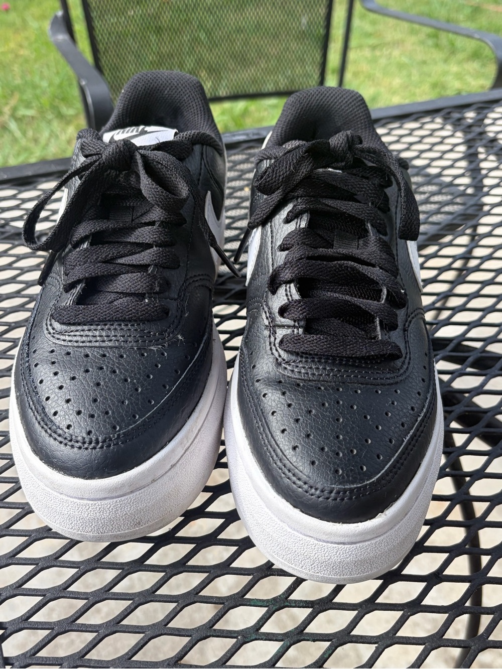 Nike Kids Black and White Low-Top Sneakers with White Swoosh